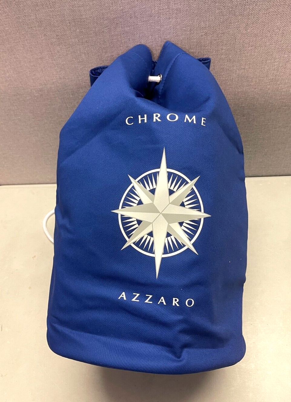 BRAND NEW AND SEALED AZZARO PARFUMS CHROME  LARGE BLUE BUCKET BAG
