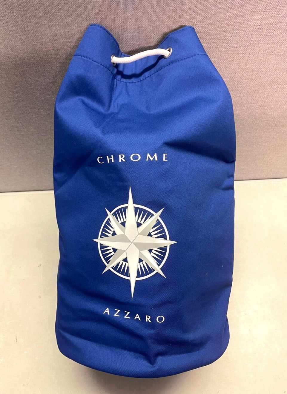 BRAND NEW AND SEALED AZZARO PARFUMS CHROME  LARGE BLUE BUCKET BAG