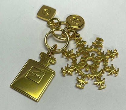 Chanel Charm Gold Tone Collectable Snowflake & Bottle Logo Charm Limited Edition